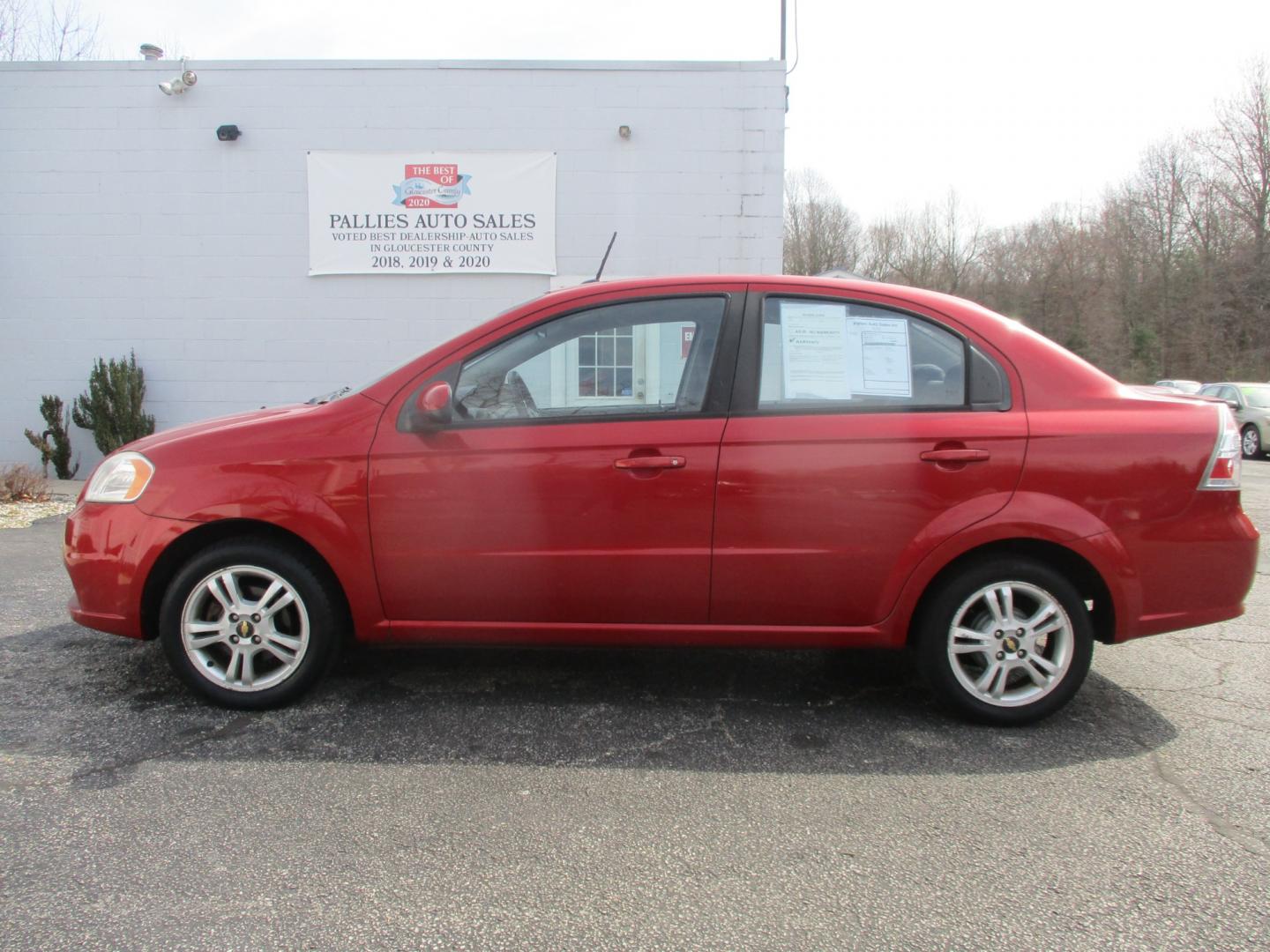 2011 RED Chevrolet Aveo (KL1TD5DE6BB) with an 1.6L L4 DOHC 16V engine, AUTOMATIC transmission, located at 540a Delsea Drive, Sewell, NJ, 08080, (856) 589-6888, 39.752560, -75.111206 - Photo#2